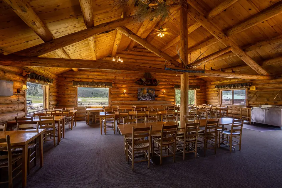 The Nugget Cafe dining room under its log roof beams