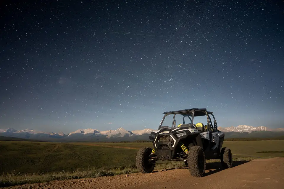 A RZR under the night sky