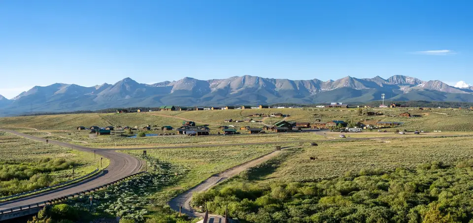 Wide view of Taylor Park and the mountains on a clear morning