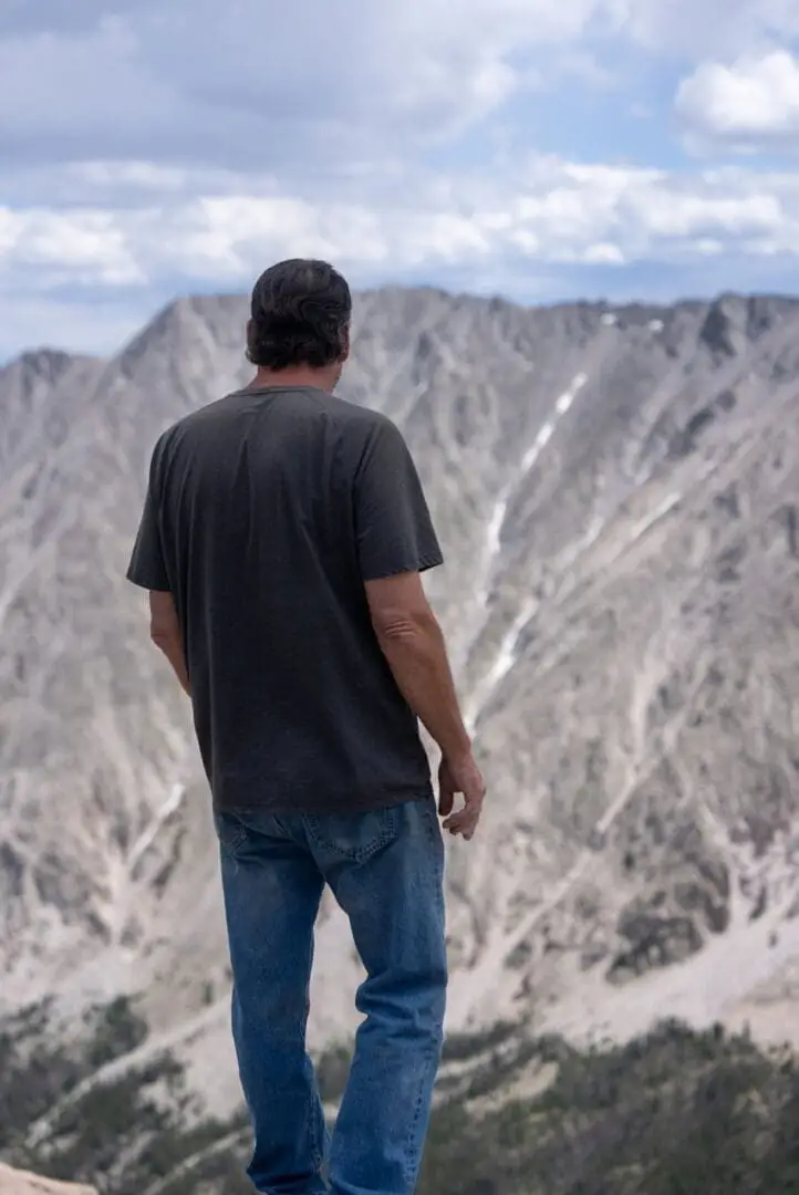 Ted, co-owner, looking out over the peaks